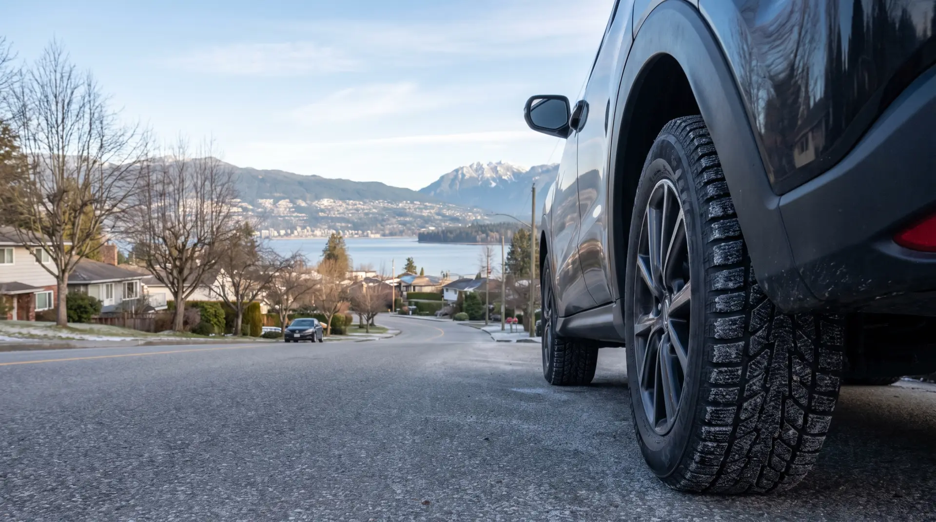 Hillside street in North Burnaby with the snowy North Shore mountains
